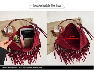 Dettaglio della grande capacità e tasche interne della borsa bordeaux con frange