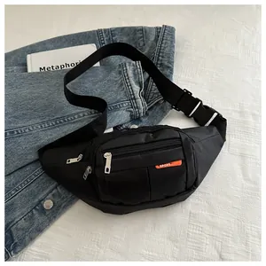 Detail view of durable black canvas fanny pack with multi-layer zippers and sport label