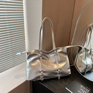 Silver metallic tote bag with buckled straps and large capacity for women