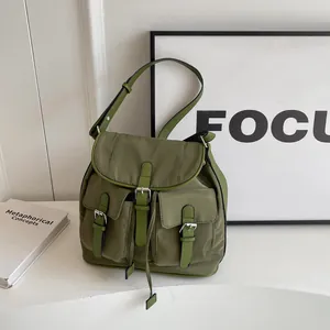 Minimalist army green multi-pocket nylon crossbody bag with adjustable strap for women