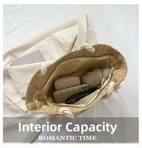 Large capacity view of beige woven tote showing phone, wallet, and essentials inside