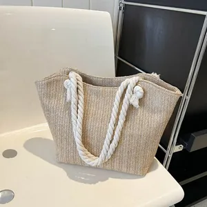 Summer woven straw tote bag with white cotton rope handles and V-shaped texture