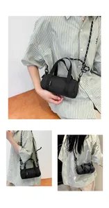 Detail of mini black cylinder bag with woven strap and branded label in a montage view