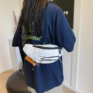 Close-up of white crossbody bag with black Tengrun logo and adjustable shoulder strap