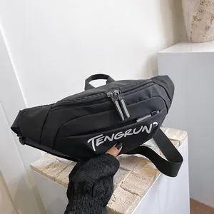 Detail of black sports chest bag with TENGRUN print and adjustable nylon strap