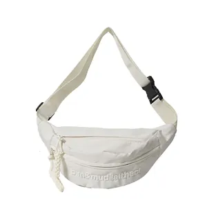 Minimalist white nylon crossbody chest bag with adjustable strap and buckle closure