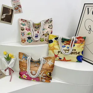 Set of printed canvas beach bags with thick hemp rope handles and diverse patterns