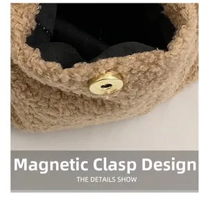 Close-up of the magnetic buckle closure and soft brown fuzzy texture on a plush handbag