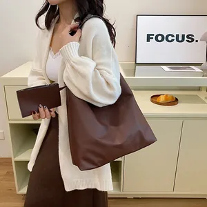 Minimalist deep brown faux leather tote bag set with matching small zipper pouch
