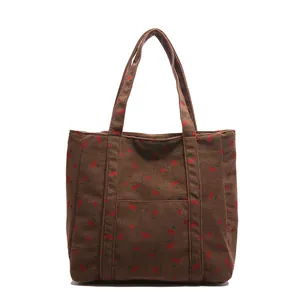 Sac fourre-tout en velours côtelé marron à motif cerises avec grande poche avant