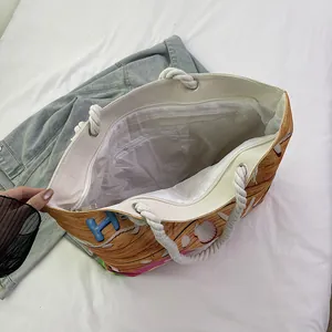 Sac de plage en toile avec motif coquillage, anses corde et poche zippée interne