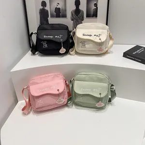 Colorful Sausage Dog canvas crossbody bags in black, white, pink, and green colors
