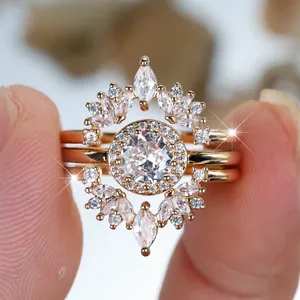 Sparkling gold multi-layer stacking ring set with round and marquise-cut crystals