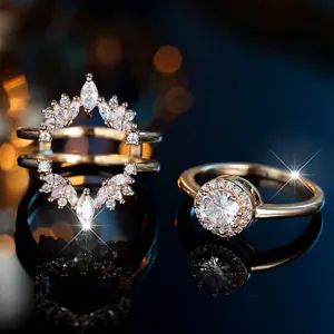 Macro detail of gold-plated crown ring jacket with sparkling round and marquise zircon stones