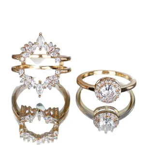 Sparkling gold tone double layer bridal ring set with halo round diamond and crown guard