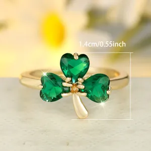 Lucky clover emerald ring with gold plating and heart-shaped green gemstones