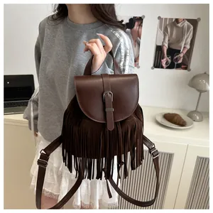 Vintage dark coffee backpack with decorative tassels and smooth leather flap for women