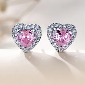 Elegant heart-shaped pink zircon stud earrings with silver metal and halo diamond setting