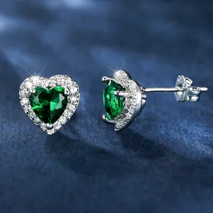 Elegant heart-shaped green zircon stud earrings in S925 silver with sparkling white crystals