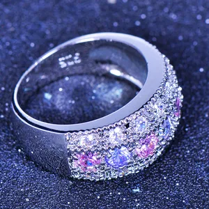 Close-up of S925 sterling silver ring with triple row pink and purple zircon stones