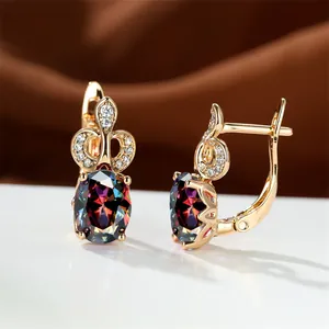 Elegante Creolen in Roségold mit ovalem Regenbogen-Zirkon und Diamant-Akzenten