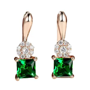 Champagne gold sunflower earrings with square blue crystal and white cubic zirconia