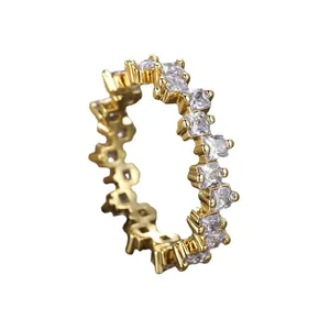 Eternity ring in gold-plated copper featuring square-cut sparkling cubic zirconia stones