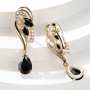 Elegant gold-plated pear-cut black gemstone drop earrings with white zircon accents