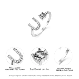 Close-up of 14K white gold plated ring with AAAAA cubic zirconia letter U and prong-set gem