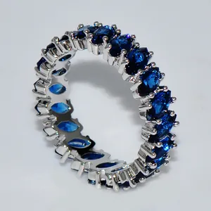 Marquise cut sapphire blue zircon eternity ring in yellow gold plating for engagement