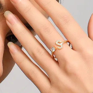 Adjustable golden letter S ring with sparkling pavé crystals and round solitaire stone