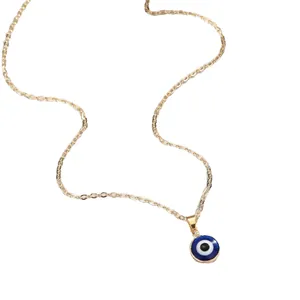 Golden chain necklace featuring a blue evil eye pendant with classic gold bezel setting
