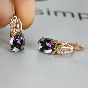 Rose gold oval mystic topaz earrings with sparkling white cubic zirconia accents