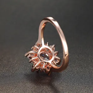 Rose gold S925 sterling silver ring with oval crystal and snowflake halo design