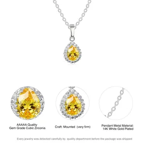 Detail view of pear-shaped yellow zirconia necklace with white gold plating and halo stones