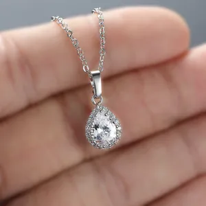 Elegant pear cut teardrop halo pendant necklace with sparkling white diamonds for women