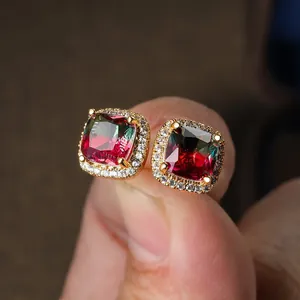 Macro shot of square gradient tourmaline stud earrings with micro-set diamonds