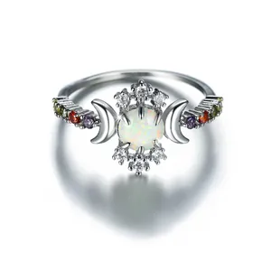 Zilveren ring met halve maan wit opaal en kleurrijke zirkonia stenen voor dames