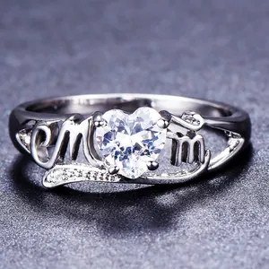 Elegant silver MOM heart ring with sapphire blue center stone and sparkling accents