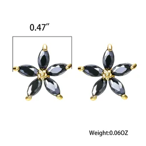 Vue détaillée des boucles d'oreilles pétales dorés avec pierres noires et dimensions