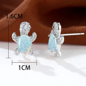 Dettagli degli orecchini a tartaruga in argento con opale blu e misure 1,6x1cm