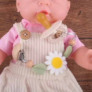 Attache-tétine tournesol en silicone et bois de hêtre pour apaiser le bébé