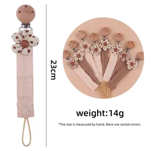 Floral beech wood pacifier clip with cotton linen strap for baby soothing safety