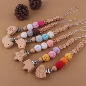 Attaches-tétines bébé en bois fait main avec perles au crochet et motifs naturels
