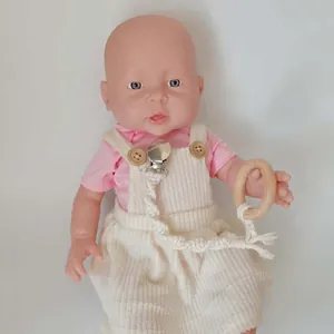 Attache-tétine fait main en coton tressé avec anneau en bois naturel pour bébé