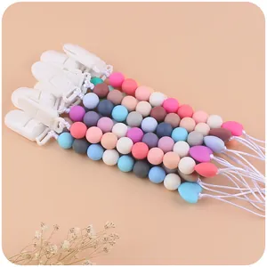 Catenelle portaciuccio in silicone con perle colorate e cuore per dentizione neonati