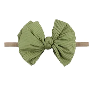 Bandeau à nœud en tricot vert olive pour bébé avec bande en nylon souple et élastique