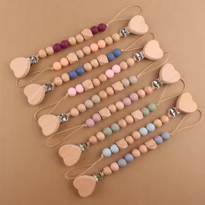 Silicone and beech wood baby pacifier clips with heart wooden clasp in various colors