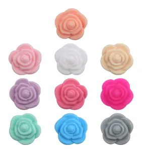 Macro view of ten colorful silicone rose teething beads for baby pacifier clip DIY