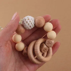 Bracelet de dentition en silicone et bois de hêtre avec lettres BABY pour bébé